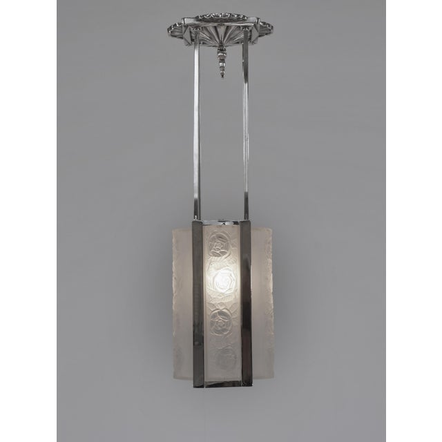 Degué A pair of French 1925-1935 art deco lanterns. Beautiful nickel plated bronze or solid brass mounts. Each holds four...
