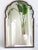 Antique large wooden scalloped mirror from the 19th century in a large size with beveled glass. The mirror has a nice...