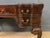 A bold and impressive writing desk in the style of Thomas Chippendale. Dating from the early 20th century and well...