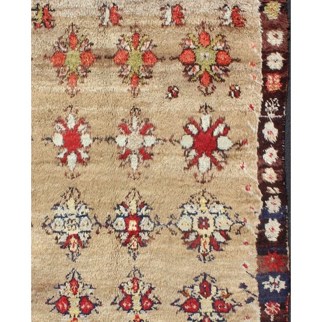 Sand Early 20th Century Angora Turkish Tulu Carpet With Colorful Floral Designs Set on Sand Field For Sale - Image 8 of 12