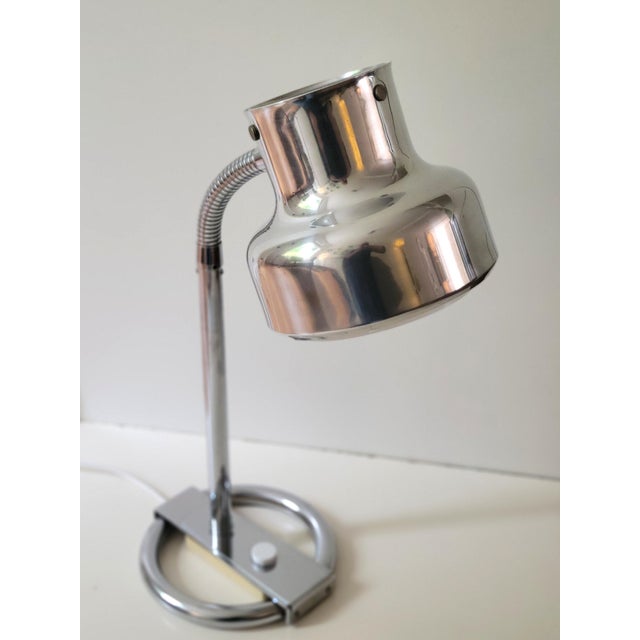 Vintage Bumling Desk Lamp in Chrome by Ateljé Lyktan, 1970s, in Very Good conditions. Designed 1970 to 1979 This piece has...