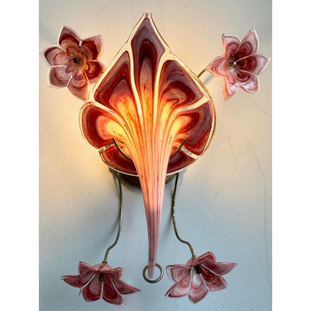 Stunning italian mid century pink murano glass and brass wall light. Masterpiece attributed to franco luce, designed for...