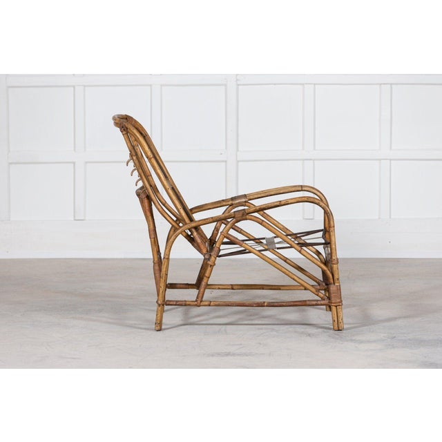 Circa 1950 Mid-century English bamboo reclining armchair. W60 x D98 x H91cm. Seat height 39cm.