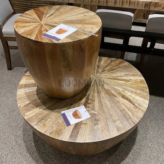 Enhance your living space with our exquisite 36" Round Solid Wood Drum Coffee Table. Made from the finest mango wood, this...