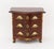 Louis XVI Style Porcelain and Gilt Metal Mounted Mahogany Diminutive Commode, the porcelain mounts hand-painted with...