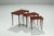 Elegant set of Danish nesting tables produced in Denmark in the 1960s. The set is crafted in beautifully grained rosewood....