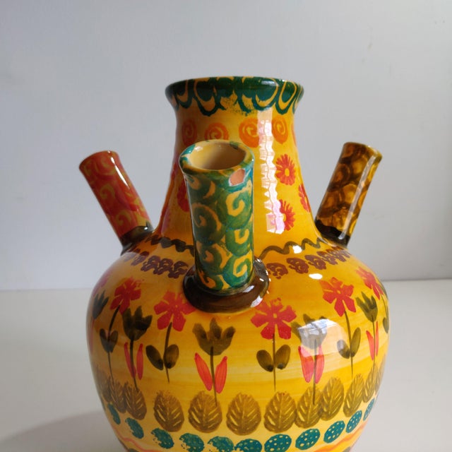 From Italian pottery Italica ARS, this is a mustard gold ceramic jug hand painted with a Tuscan color story. It is a large...