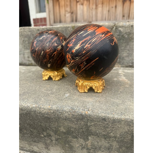 These are fabulous orange, black and cream colored duck pins from back in the 70s. Someone paired them with gold bases...