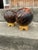 These are fabulous orange, black and cream colored duck pins from back in the 70s. Someone paired them with gold bases...