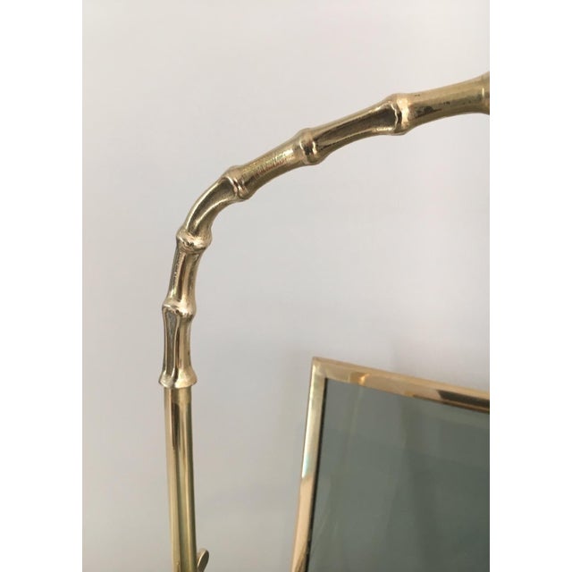 This beautiful faux bamboo magazine rack is made of bronze with blueish glass panels on each side. The quality of this...