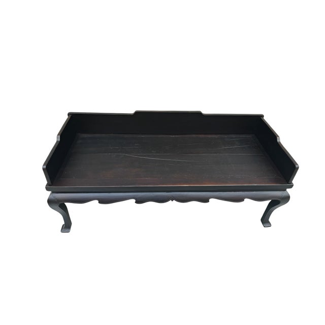 This antique daybed originally served as the decorative front facade of a traditional Chinese canopy bed (kaoshan). It...