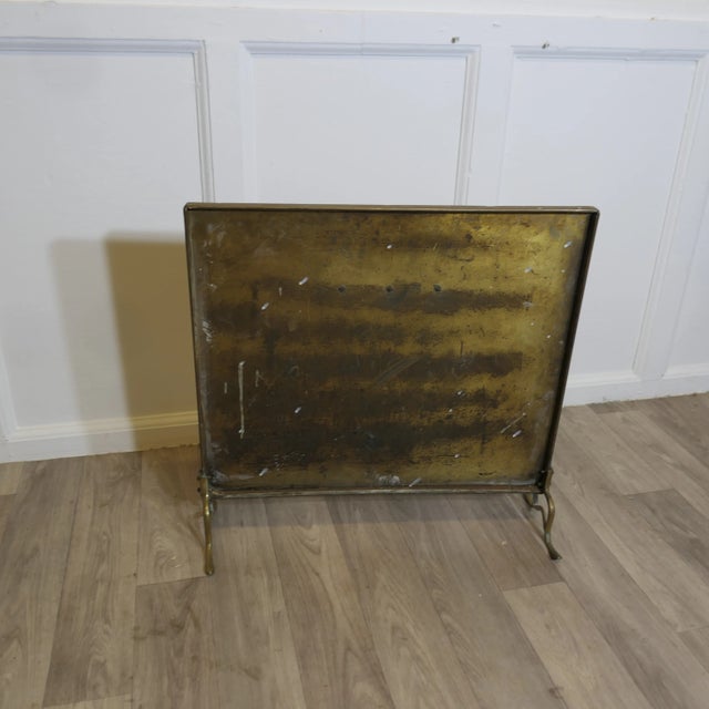 Stylish Art Deco Brass Fire Screen This is a charming and minimalist screen, the screen has small design to the front and...