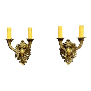 Mid 20th Century Pair Of Bronze Shield Back Two Arm Wall Sconces For Sale