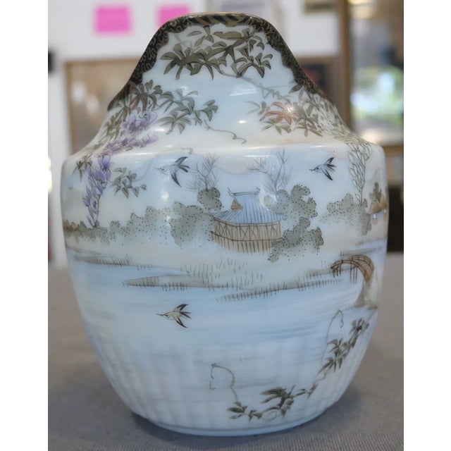 Up for sale is a Circa 1920 Japanese Kutani Porcelain Landscape/Floral/Bird Motifs Lobed Body Creamer Pitcher (Taisho...