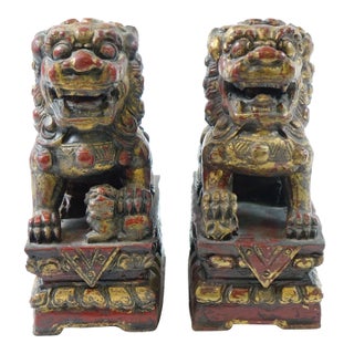 Antique Chinese Wood Sculptures of Foo Dogs - A Pair For Sale
