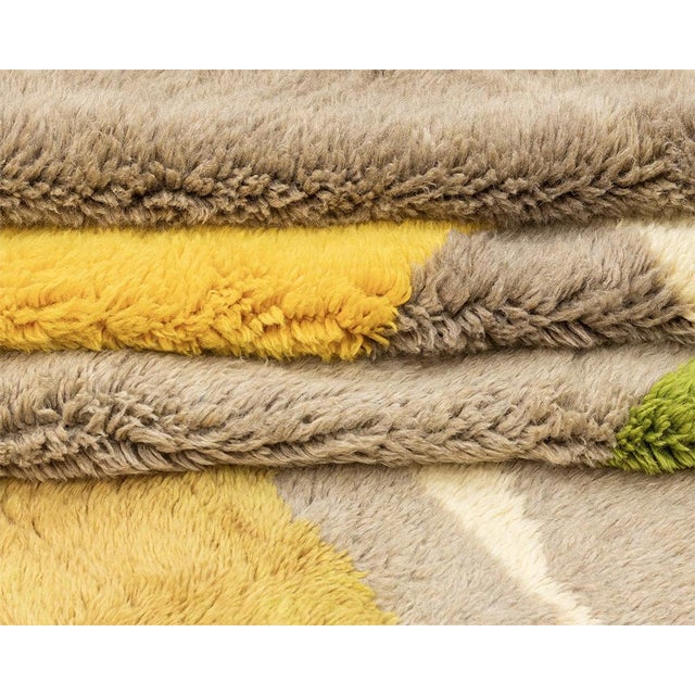 A modernist composition, woven thread by thread. This oversized hand-knotted Moroccan rug reads like a Miró or Klee...