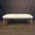 A refined 19th century French walnut bench featuring gracefully turned legs and a beautifully figured walnut frame. Newly...