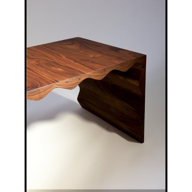 A dialogue between past and present, captured in wood. This coffee table draws inspiration from the hidden interspaces of...