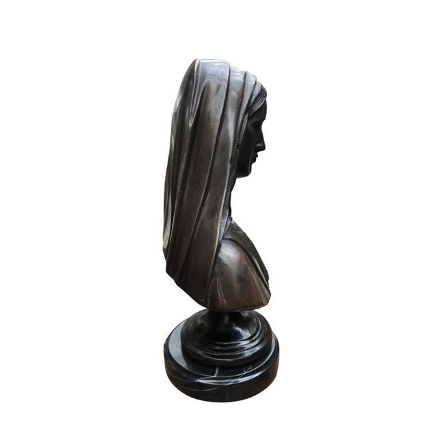 A wonderful bronze casting depicting the virgin mary. Artist has really caught the beauty of the holy mother with great...