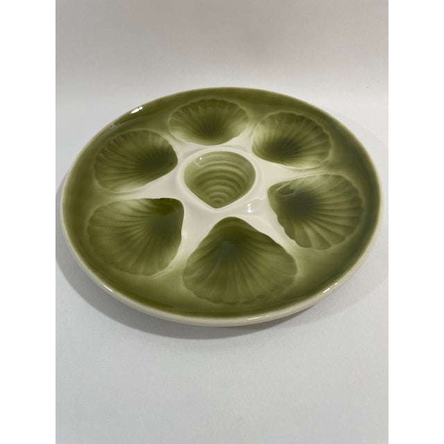 A beautiful Mid Century French faience glazed Majolica Oyster Plate made in Orchies, France at the Moulin des Loupes...