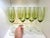 Modern 1990s Set of 8 Vintage Olive Green Stemmed Hand Blown Glass Champagne Flutes For Sale - Image 3 of 4