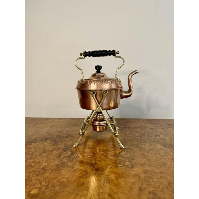 Wonderful antique Victorian quality copper and brass spirit kettle and stand, having a quality ornate copper kettle with...