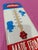 Capture the vibrant charm of mid-century Americana with this exquisite Vintage-Style Nesbitt's of California Metal...