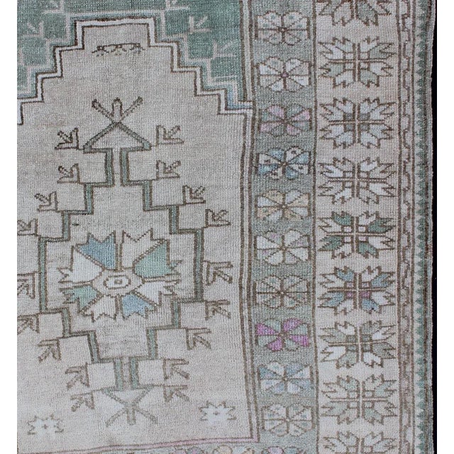 Tribal Vintage Turkish Oushak Square Rug With Medallion in Soft Green and Creams Vintage tribal Turkish Oushak square size...
