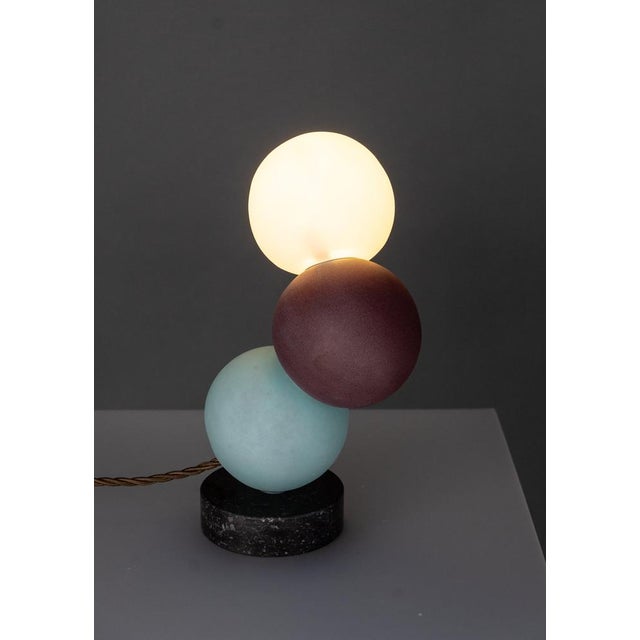 Contemporary style Table Lamp, Marble, Multicolor Hand crafted glass, Black, D165xH265mm, 1xG9 This piece has an...