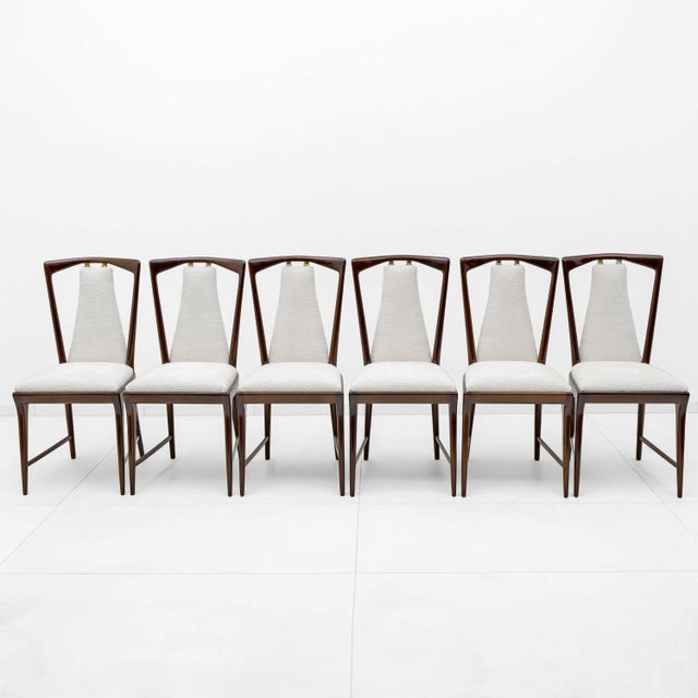 Elegant lines and a solid structure characterize this splendid set of six dining chairs, designed by Osvaldo Borsani in...