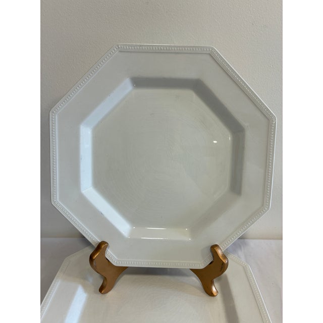 A charming set of two vintage English ironstone dinner plates from Johnson Bros' "Heritage" line. These octagonal plates...