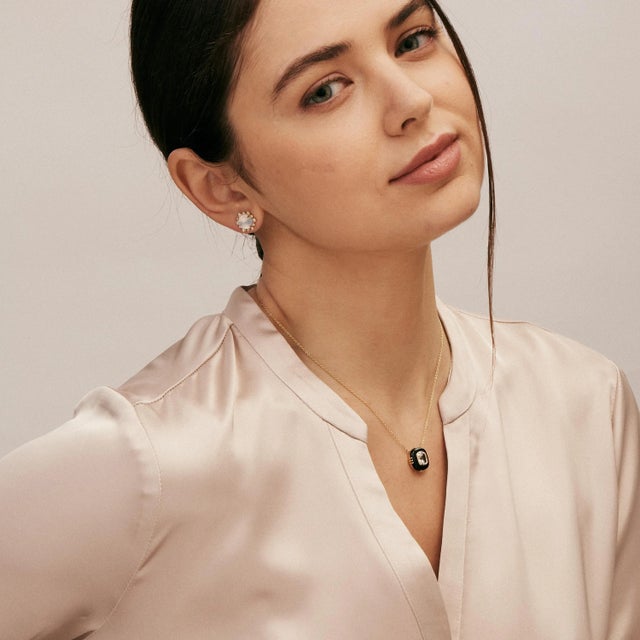 Created in 18 karat yellow gold Rock crystal 1.20 carats approx. Black onyx 2.50 carats approx. 18 inch chain with loops...