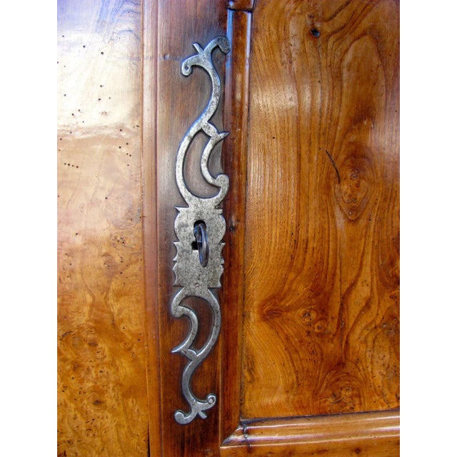 French fruitwood two drawer two door buffet. C. 1830. Shaped door panels, great iron hardware. One interior shelf....