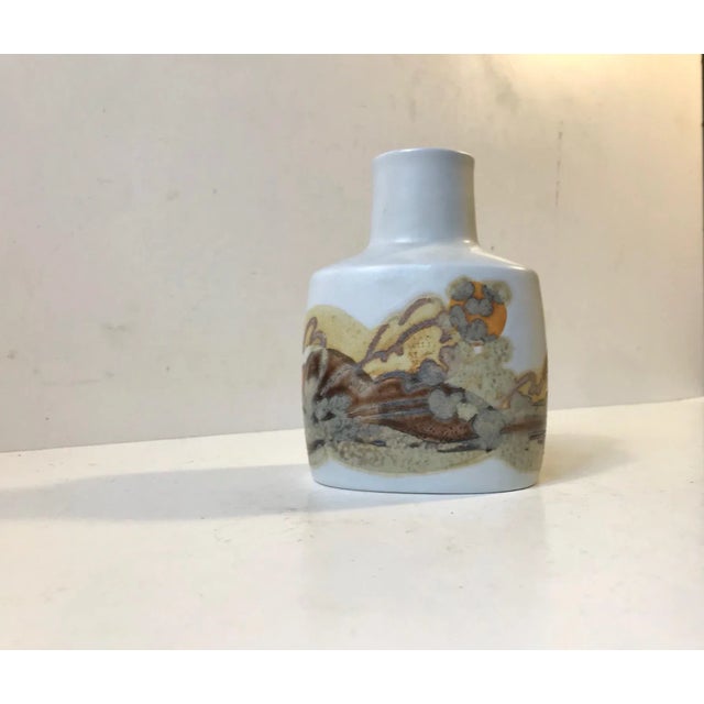 A fajance vase with abstract - modernistic glazed motif in contrasting glazes. Both designed by the danish ceramist Ellen...