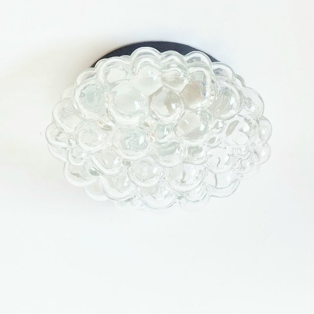 Stunning and rare set consisting of 1 flush mount/ceiling light and 2 wall lights designed by Helena Tynell for Limburg,...