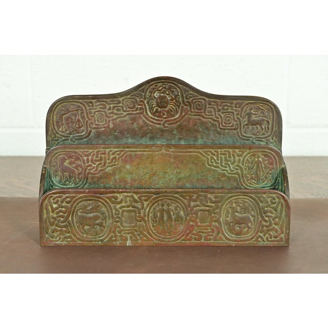 A gorgeous antique Arts & Crafts or Art Deco period patinated bronze "Zodiac" pattern desk letter holder rack By Tiffany...