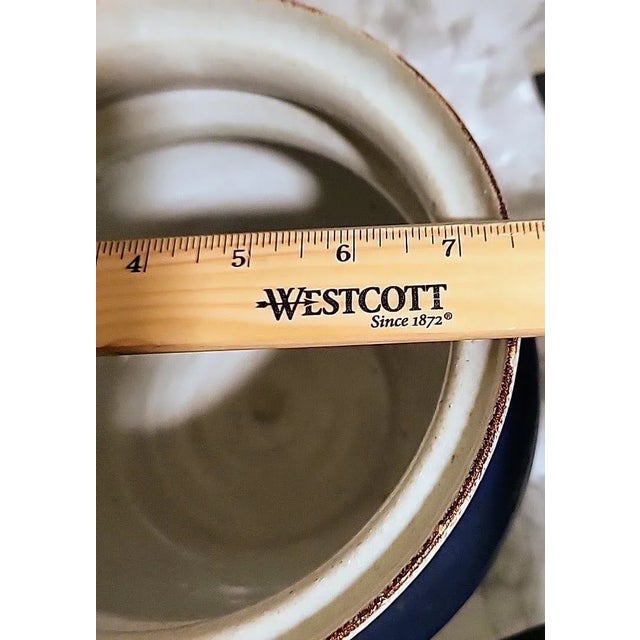 Vintage studio art pottery vessel signed by the artist. Beautiful traditional colors add to any room. Great lines with...