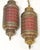 Classic pair of Middle Eastern style lanterns from the mid 20th century. They are made of hammered and pierced brass with...