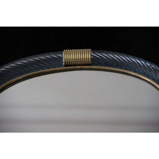 This magnificent pale blue vertical mirror is crafted in the pure tradition of Venetian glassmaking. The technique used to...