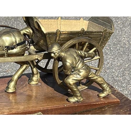 Huge Brass Centrepiece Of A Farmer with His Horse & Cart. "Toil" Mounted on a wooden base. Size :- 42 cms wide, 22.5 cms...