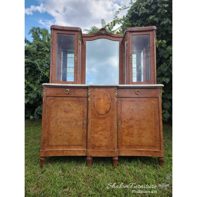 Bring home this Antique French Victorian Sideboard Buffet Cabinet and make a statement of luxury and sophistication in...