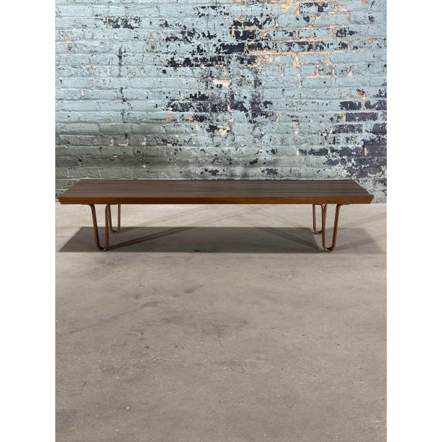 Edward Wormley Long John Bench by Dunbar, 1960. Bench has been completely restored. Measures 59.75" long, 18.75" deep 12"...