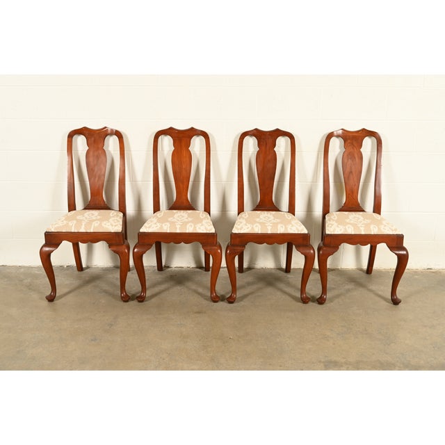 An outstanding set of four Queen Anne or Georgian style dining chairs By Henkel Harris USA, Circa 1970s Solid cherry wood...
