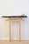 Tori ii console in solid oak wood and stone by jean-baptiste van den heede dimensions: d 21 x w 79 x h 83 cm materials:...