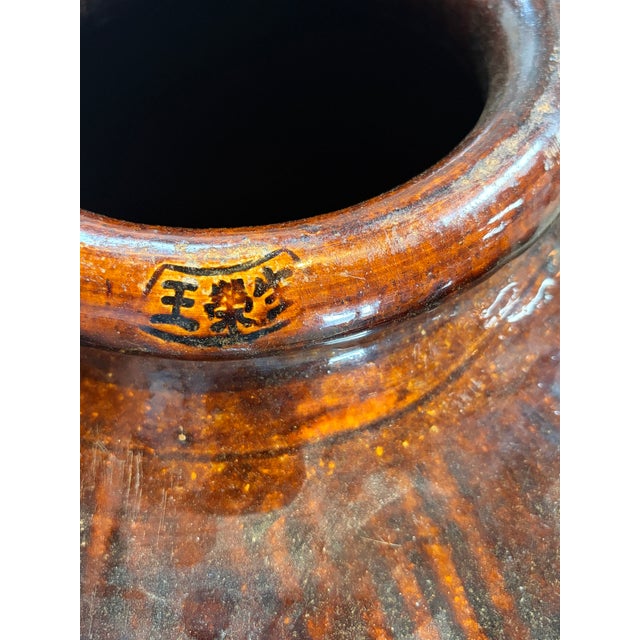 Monumental Japanese brown-glazed stoneware storage jar (ōtsubo), probably Tokoname ware, first half of the 20th Century...