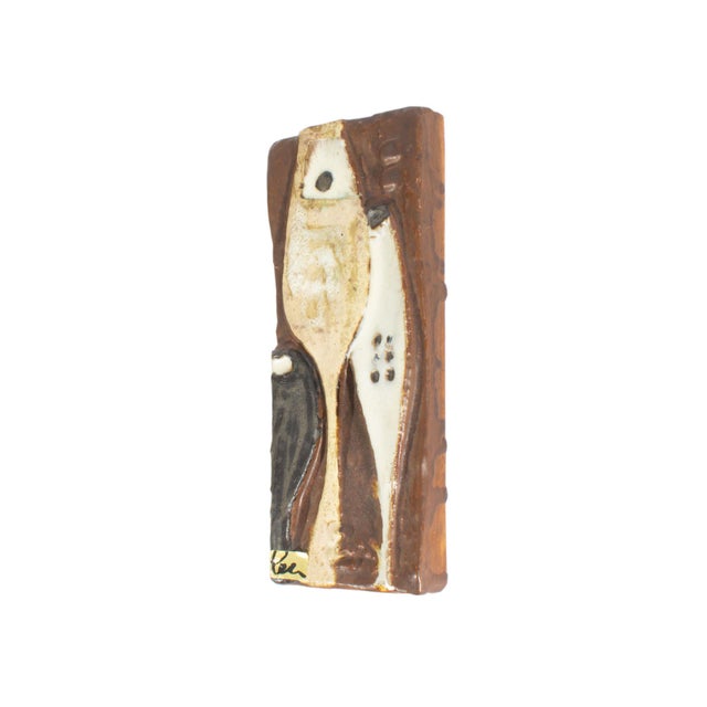 A ceramic wall plaque by Helmut Friedrich Schäffenacker (1921-2010). Made in Germany, this rectangular plaque features an...