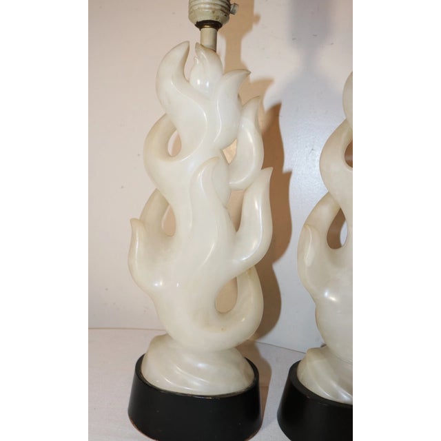 Up for sale is a very high quality pair of carved antique alabaster electric table lamps. These large lamp sculptures are...