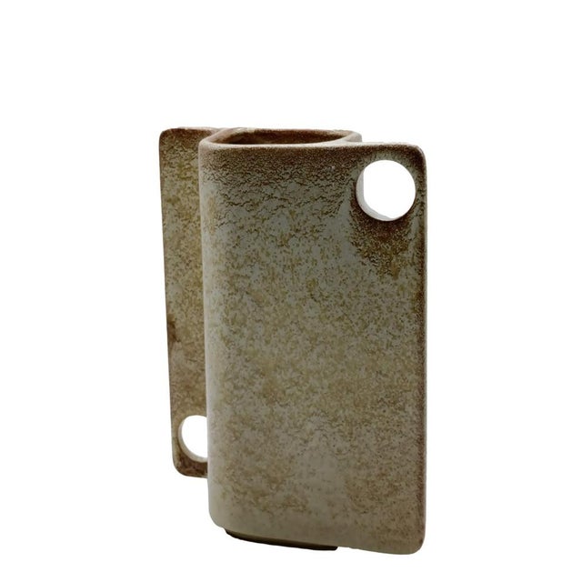 Fantastic Abstract ceramic sculpture vase glazed ivory cream color with light brown terracotta pigment and rust. from the...