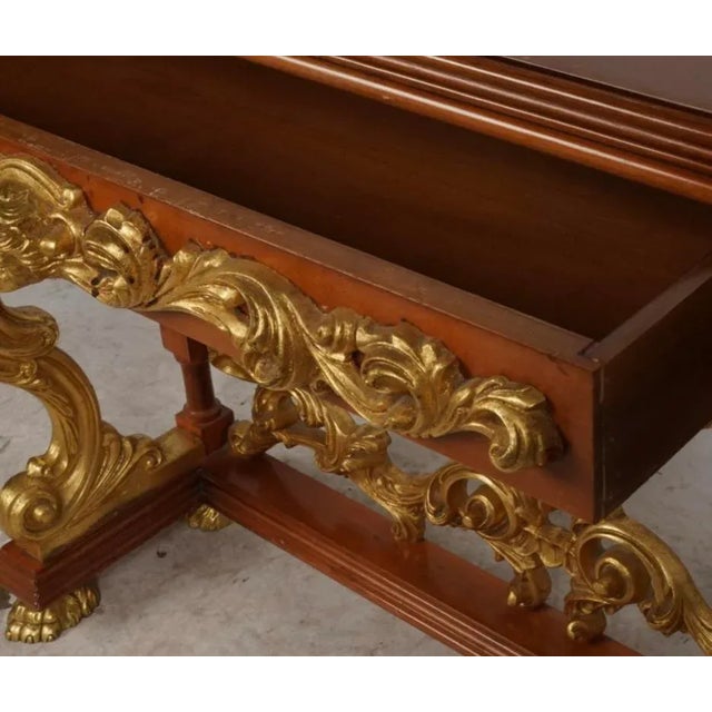 Antique Regency Style Giltwood & Mahogany Figural Console Table. Featuring exquisitely carved details including faces and...