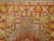 An authentic early 20th century Turkish Oushak featuring a lime green color on a silver colored ground. 3'10'' x 6'1''